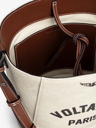 Z Bucket Voltaire Bag - Canvas and grained leather bucket bag with adjustable strap and wing signature.