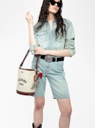 Bolso Z Bucket Voltaire - Bolso saco de lona y cuero granulado con correa ajustable y firma de alas.