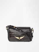 Le Zazi Croco Tasche - Kleine Tasche aus Leder mit Kroko-Effekt, verstellbarem Schulterriemen und charakteristischen Flügeln.