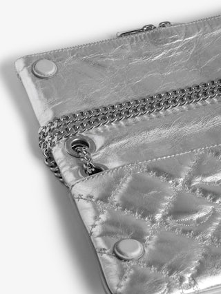 Rock II Silver Metallic Clutch - Pochette in quilted metallic leather with sliding metal chain and signature wings.