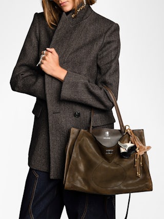 Jack Bag - Suede leather bag with signature clasp, featuring two compartments, one handle and adjustable strap.