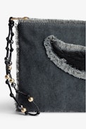 Uma Clutch - Women's black cotton clutch bag with fringing, wings patch and a beaded strap