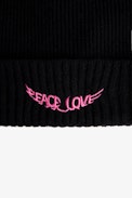 Susana Girls’ Beanie - Girls black wool mix beanie with wings motif on front.