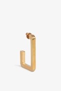 Cecilia Earrings - Large C-shaped earrings in hammered gold-tone brass.