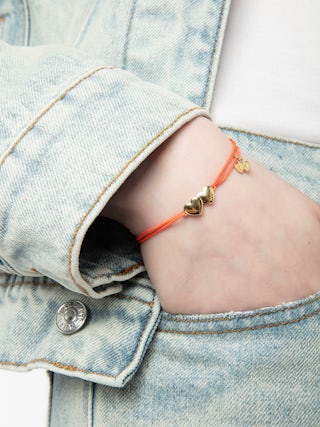 Zadig Link Heart Bracelet - Adjustable cord bracelet with iconic double engraved hearts from the house.