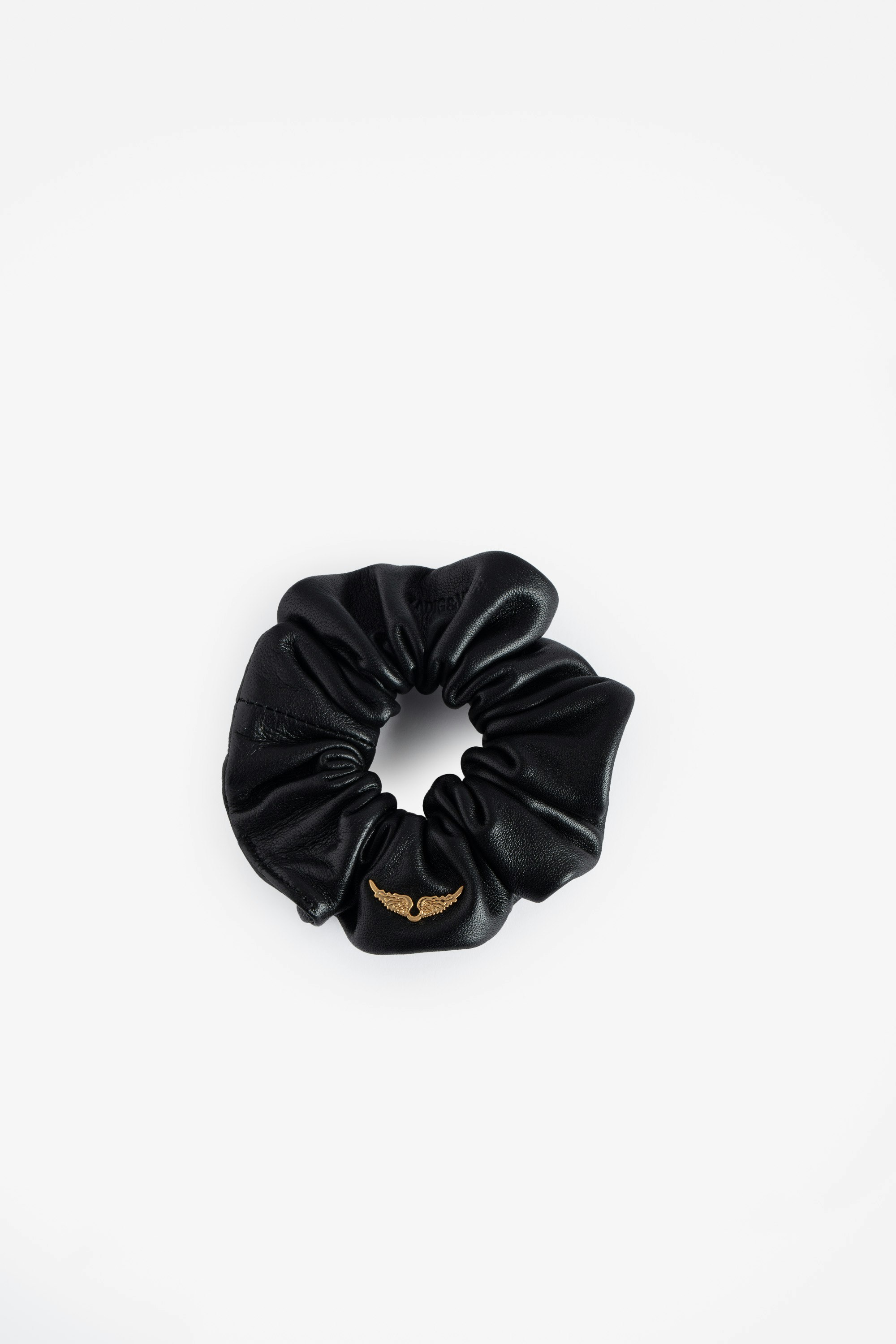 Scrunchie Chouchou - Voltaire Vice Scrunchie aus schwarzem Leder mit Flügelmotiv.