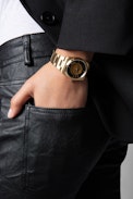 Fusion Happy Glitter Watch - Women’s gold-tone steel watch featuring a black dial with happy glitter background