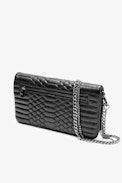 Rock Quilted Clutch - Rock iconic women’s quilted black leather clutch.