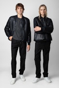 Leo Shearling Jacket - Unisex navy blue shearling jacket with topstitched arrows on the sleeve.