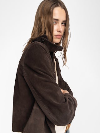 Lessa Suede Leather Jacket - Short buttoned jacket in suede leather with embossed wing on the back.