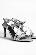 Marilyn Metallic Sandals - Women’s sandals with silver-tone heels.