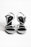 Marilyn Metallic Sandals - Women’s sandals with silver-tone heels.