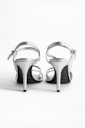 Marilyn Metallic Sandals - Women’s sandals with silver-tone heels.