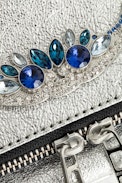 Rock Metallic Jewel Clutch - Women's silver-tone clutch in leather, embellished with beads.