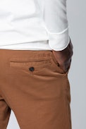 Pit Pants - Men’s brown chino pants.
