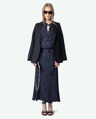 Caprese Sandals - Heeled sandals with leather strap adorned with a wing charm and a signature buckle.