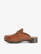 Azora Clogs - Leather clogs with wooden heel adorned with a wing charm chain.