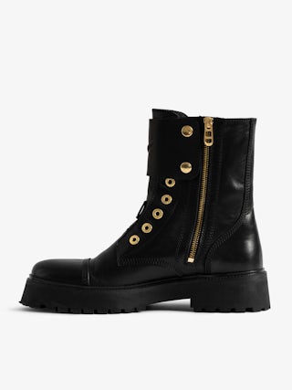 Joe Boots - Women's laceless combat boots with gold toned hardware.