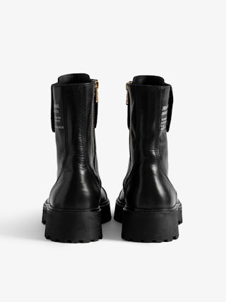 Joe Boots - Women's laceless combat boots with gold toned hardware.