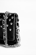 Pochette Rock Nano Heart - Mini pochette noire femme en cuir grainé.