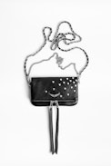 Pochette Rock Nano Heart - Mini pochette noire femme en cuir grainé.