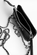 Pochette Rock Nano Heart - Mini pochette noire femme en cuir grainé.