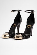 Sandalen Amee Leder - Damensandalen aus schwarzem Leder mit goldfarbener Spitze