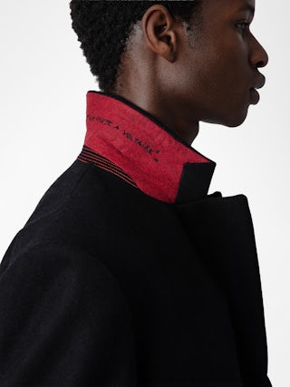 Marlyh Coat - Mid-length unisex coat with contrasting collar featuring "C'est la faute à Voltaire" inscription.