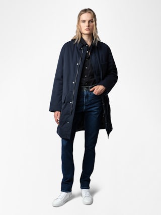 Mel Coat - Unisex mid-length coat featuring a rubber studio badge.