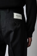 Paris Pants - Unisex tailored black wool pants with studio insignia on back.