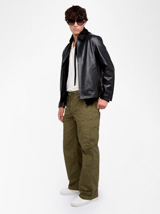 Trousers Palmyr - Wide, fluid pants with an elastic drawstring waist, center button placket and zip fly, finished with embroidery.