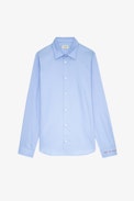 Camicia Sydney - Camicia unisex in cotone azzurro decorata con ricamo "Art Is Truth" sul polsino destro.