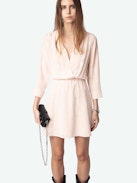 Rucas Dress - Light pink ruched mini dress with Flash Hearts print, long sleeves, and draped skirt.