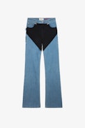 Emila Jeans - Women’s wide-leg blue denim jeans with contrasting black panels.