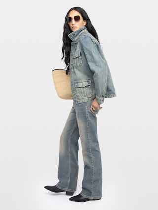Lienna Denim Jacket - Multi-pocket denim jacket with buttoned closure and chest wing.