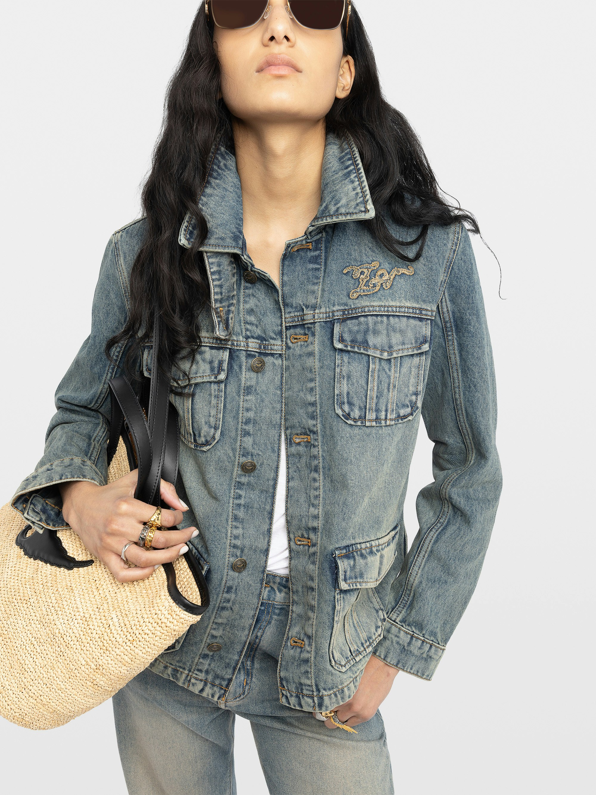 Lienna Denim Jacket - Multi-pocket denim jacket with buttoned closure and chest wing.