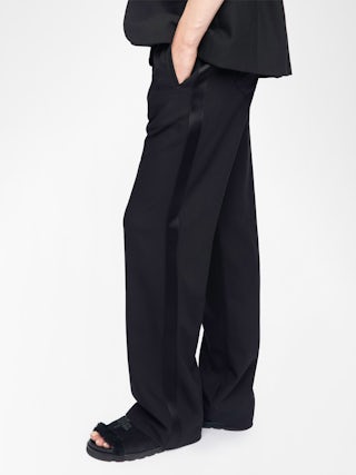 Poma Trousers - Straight-cut tailored pants with a jogging-inspired design, featuring satin stripes and an elastic waistband.