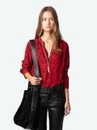 Tink Blouse - Long-sleeved red blouse with Wild Voltaire print, open collar and gathered details.