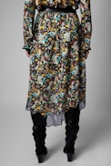 Joslin Skirt - Women's mid-length asymmetrical circus print skirt. Made with recycled fibers