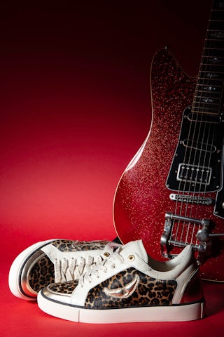 Low-Top Fly On Sneakers - Low-top sneakers in a mix of leopard-effect leather and crinkled leather with embossed wings.