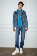Base Jacket - Men’s faded denim jacket with appliqué on back